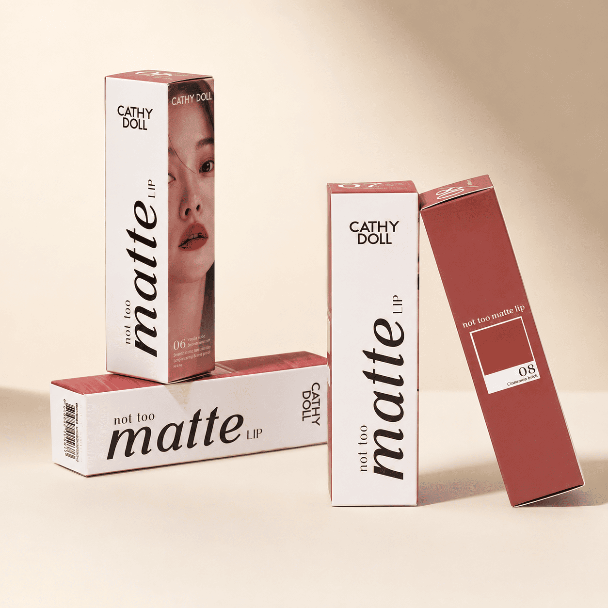 Bespoke lipstick boxes with full-color editorial photography printed across the carton for a matte lip range