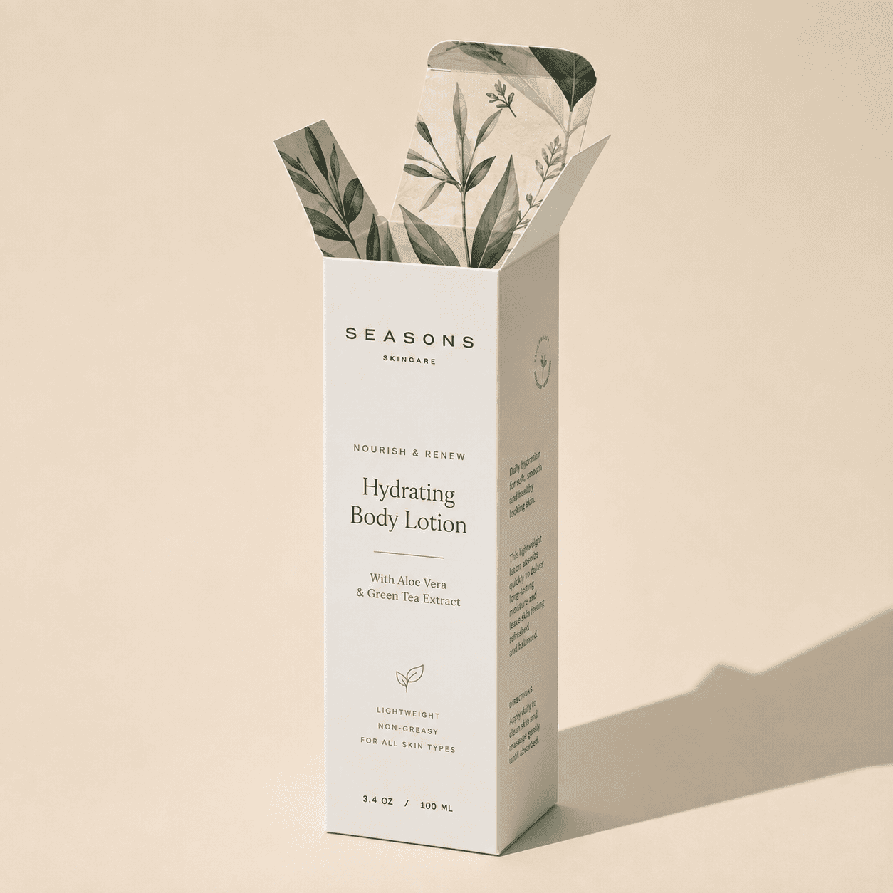Printed lotion box opened to show botanical leaf artwork across the inside of the tuck flaps